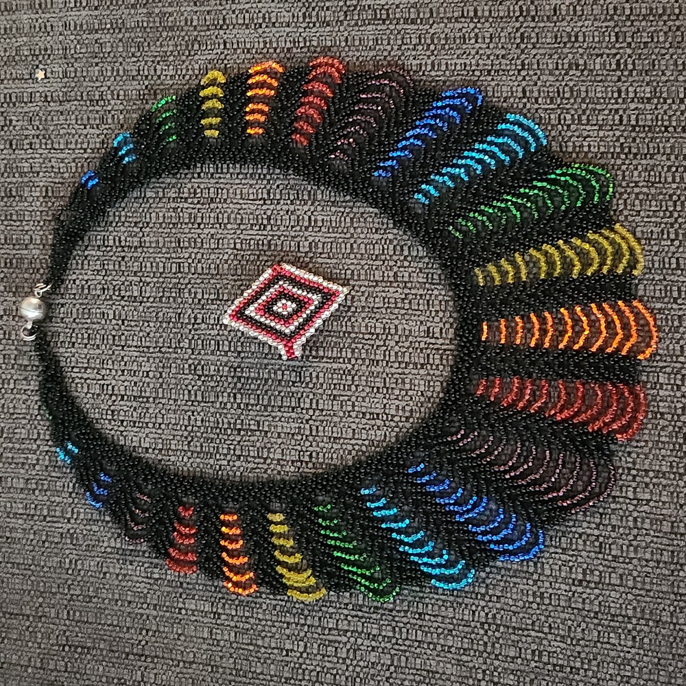 Beautiful rainbow beaded necklace and ring